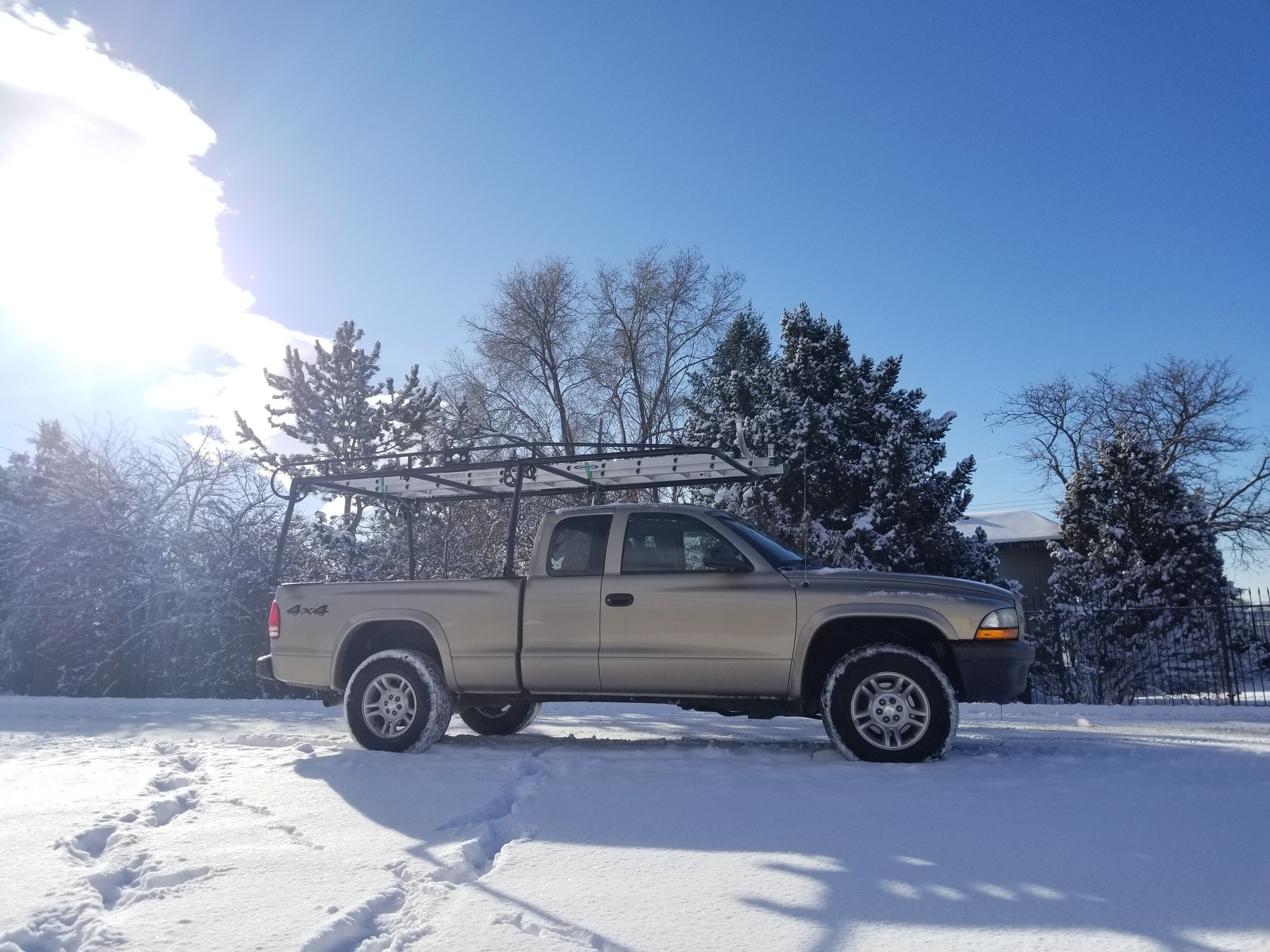 MG Cleaning Systems work truck in a Colorado neighborhood after snow