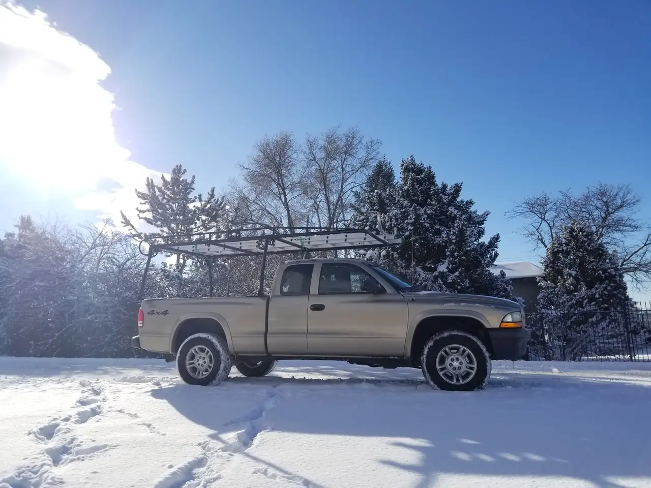 MG Cleaning Systems work truck in a Colorado neighborhood after snow